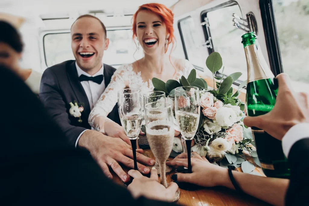 stylish-happy-bride-and-groom-toasting