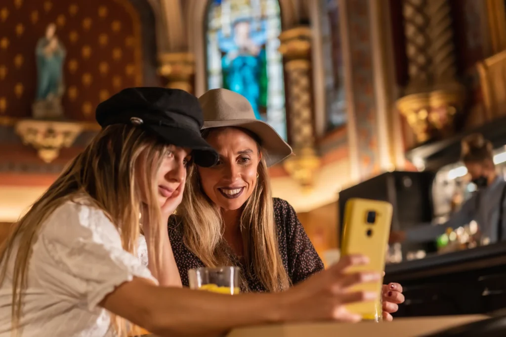 wo-tourist-friends-looking-on-the-phone